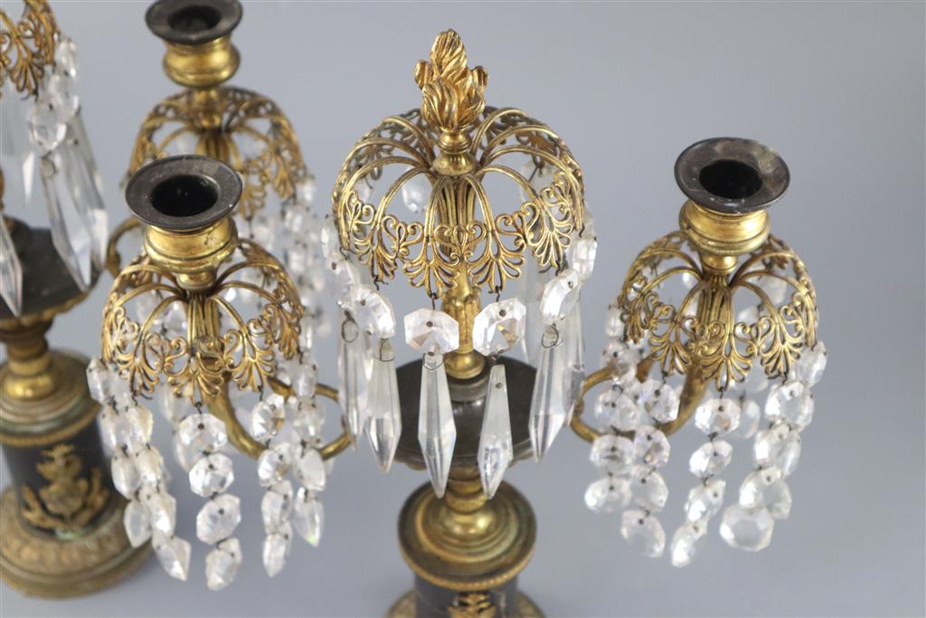 A pair of Regency bronze and ormolu lustre candelabra, height 14in.